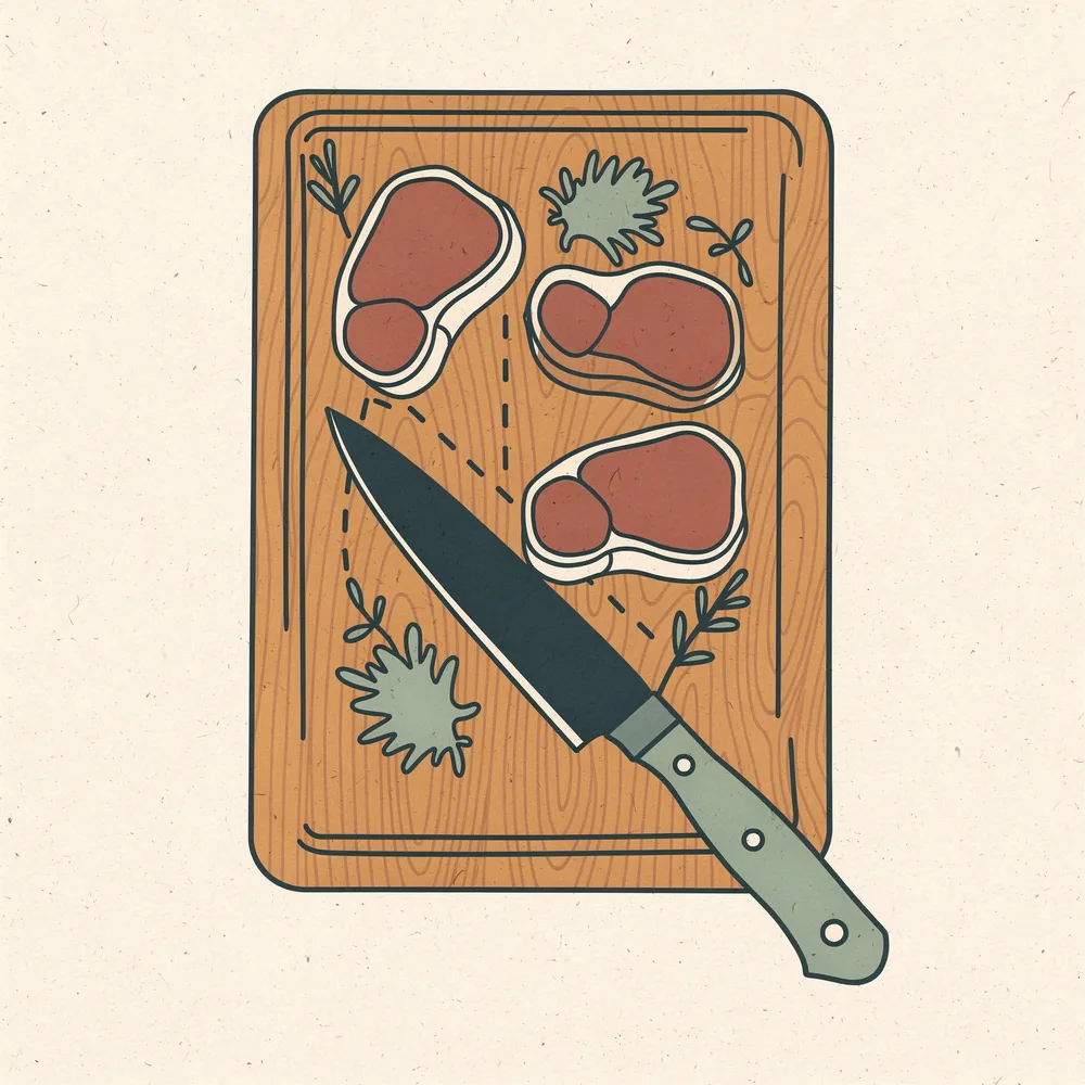 A cutting board with a chef's knife and steak and roast cuts laid out